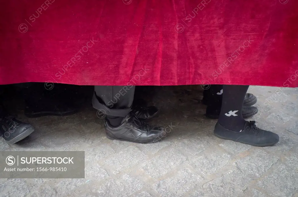 Penitents´feet detail, La Lanzada brotherhood procession during Holy Week in Seville, Andalusia, Spain