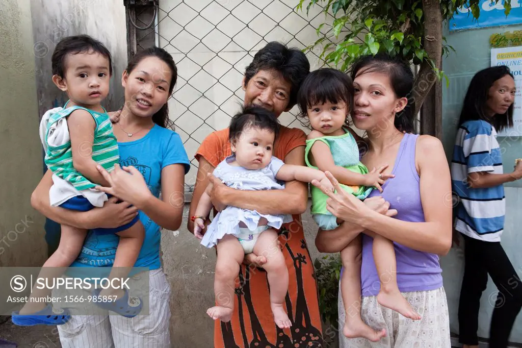A three generation Filipino family  Lapu-Lapu City, Metro Cebu, Mactan Island, Visayas, Philippines