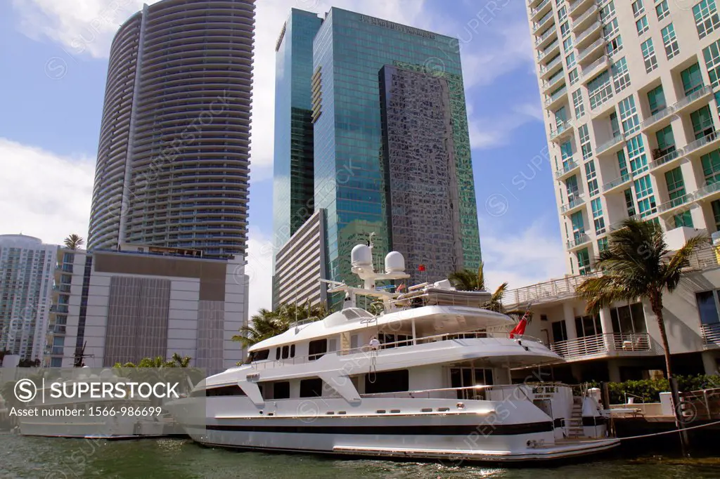 Florida, Miami, Miami River, Riverwalk, high-rise downtown office building, Wells Fargo Center, centre, Epic Hotel, mega yachts, city skyline,
