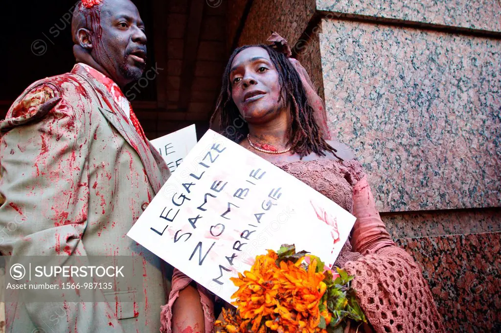 Two zombies protesting for ´Same Zombie Marriage,´ at a Zombie Crawl in New York City