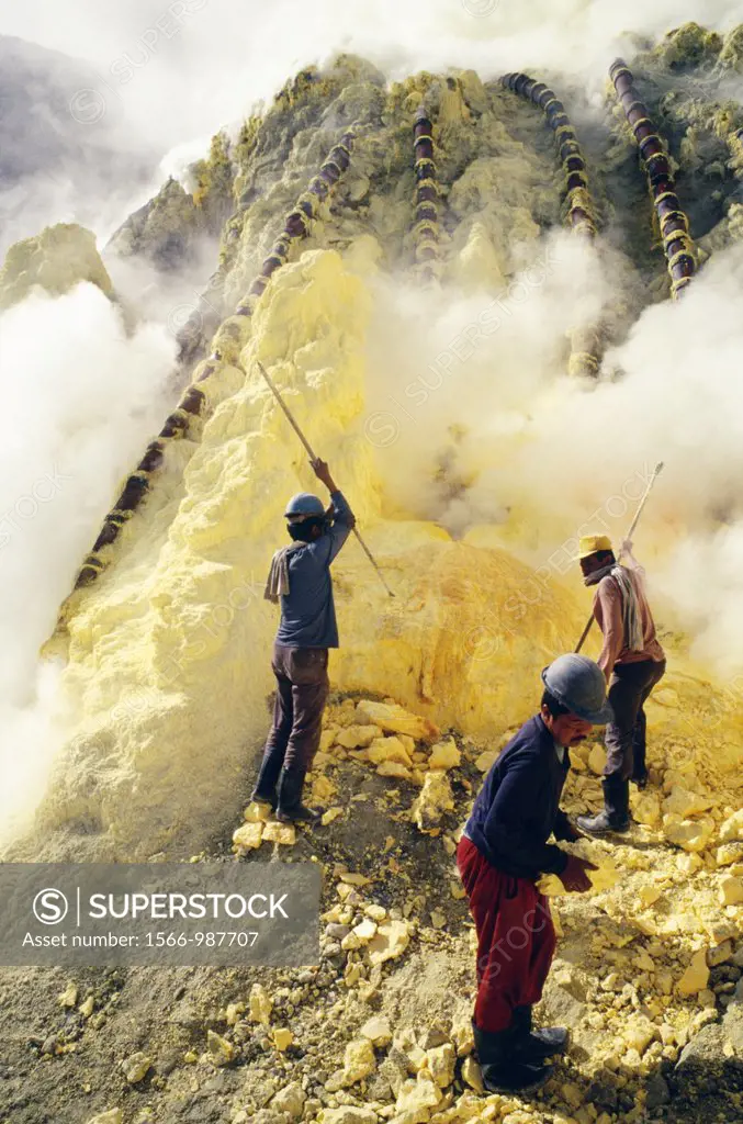 Workers on the Kawah Ijen Volcano mining for sulfur.