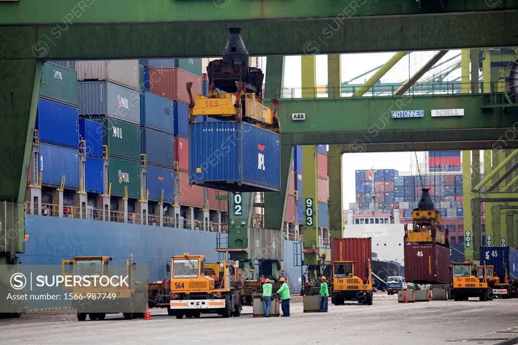 Machinery and ships under operation at the Port of Singapore Authority PSA in Singapore PSA Singapore Terminals is the worlds largest container trans...