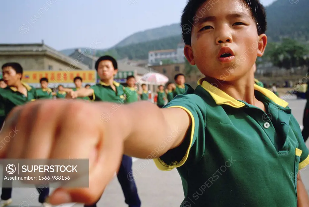 Children at the Ta Gou Academy in Shaolin Ta Gou is the largest martial arts school in the world, with 18, 000 students as of Jan 2006 Children train ...