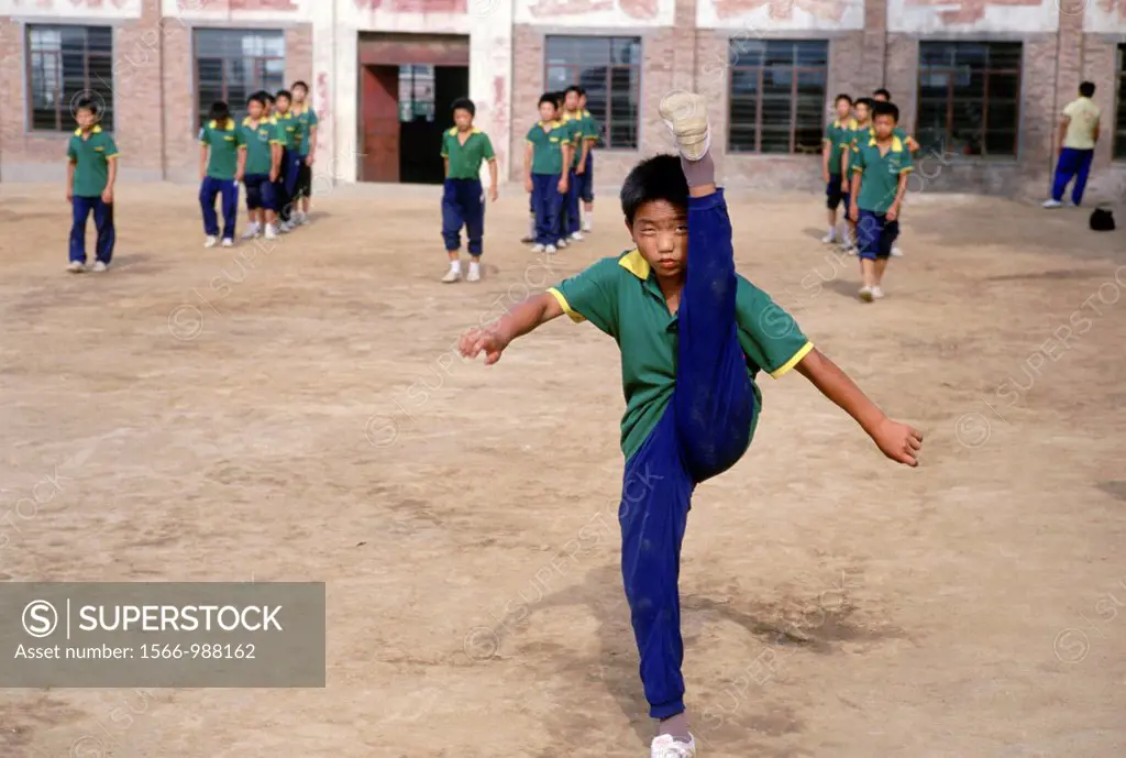 Children at the Ta Gou Academy in Shaolin Ta Gou is the largest martial arts school in the world, with 18, 000 students as of Jan 2006 Children train ...