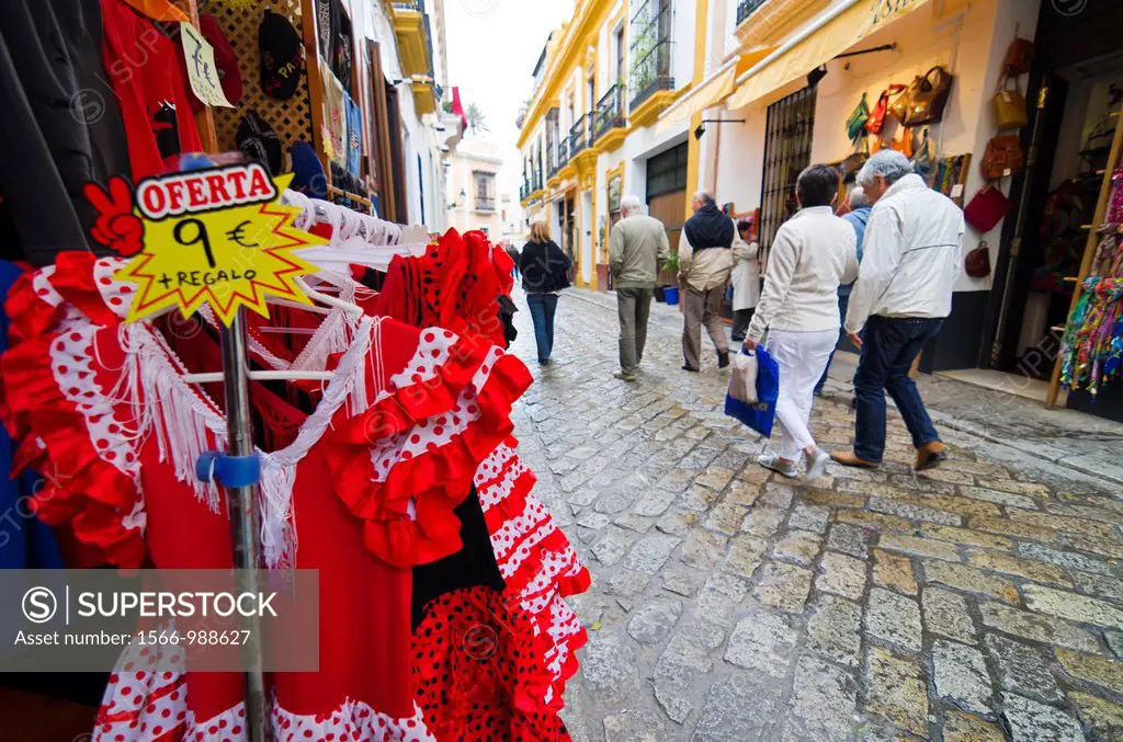 Colourful dress of ´Gitana´ in shop of Santa Cruz district in Seville, Andalusia, Spain, Europe