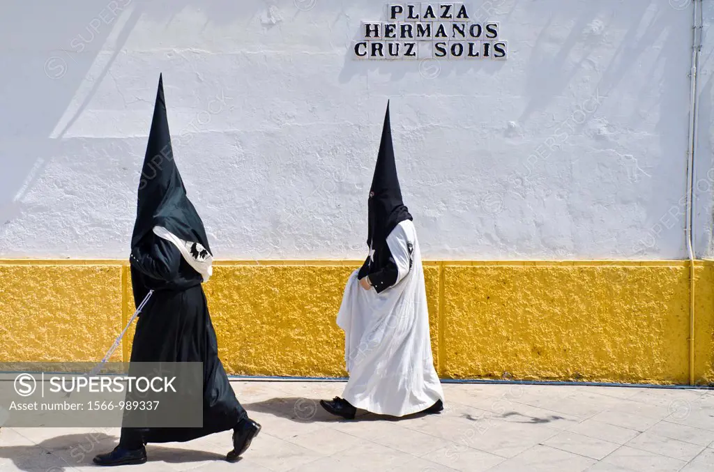 El Cachorro brotherhood Penitents in Seville during Holy week celebration, Andalusia, Spain, Europe