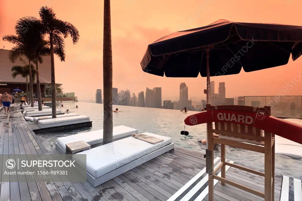 Singapore, swimmingpool and Singapore Skyline on the 57th floor of Marina Bay Sands Resort