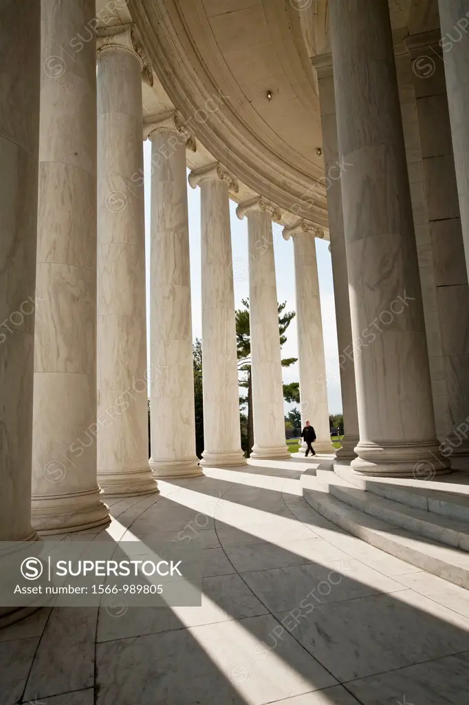 Marble columns create a shadow pattern at the Jefferson Memorial