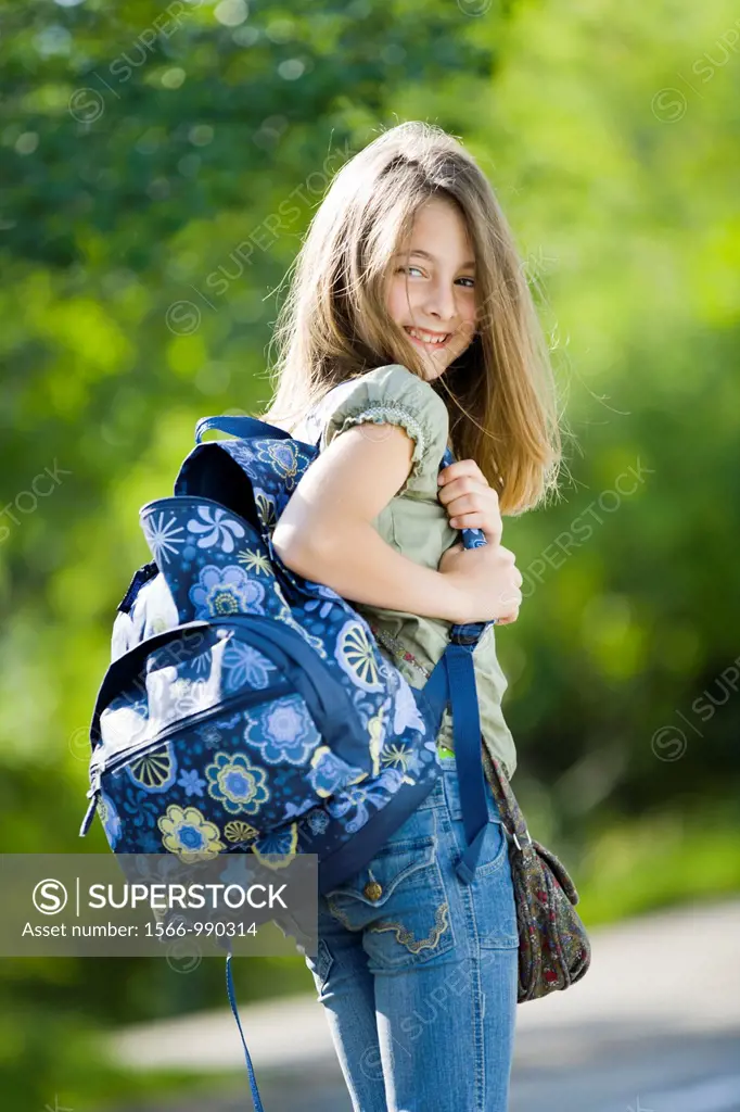 Young schoolgirl in the park