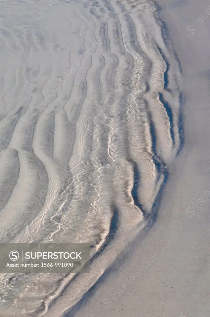 Wave pattern in the sand.