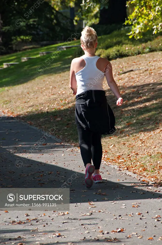 young woman, fitness walking, early autumn, Geneva, Switzerland, Europeans