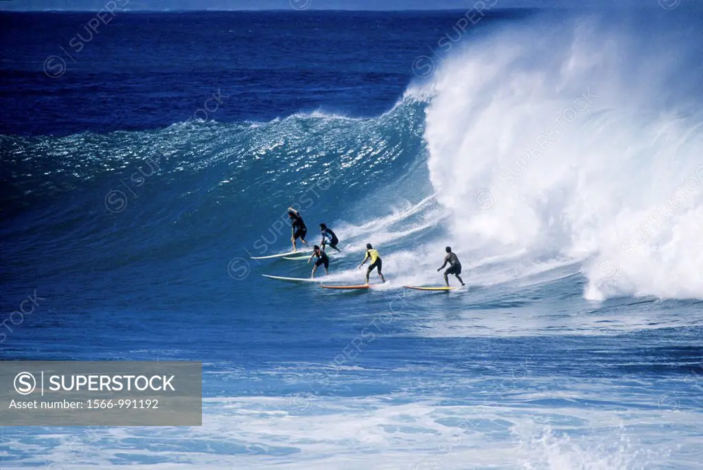 Surfers On 30 Foot Wave Waimea Bay North Shore Oahu Hawaii USA