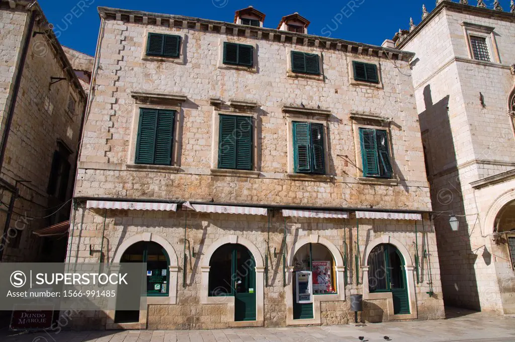 Typical 17th century house built after the earthquake along Stradun main street at Luza square Grad the old town Dubrovnik city Dalmatia Croatia Europ...