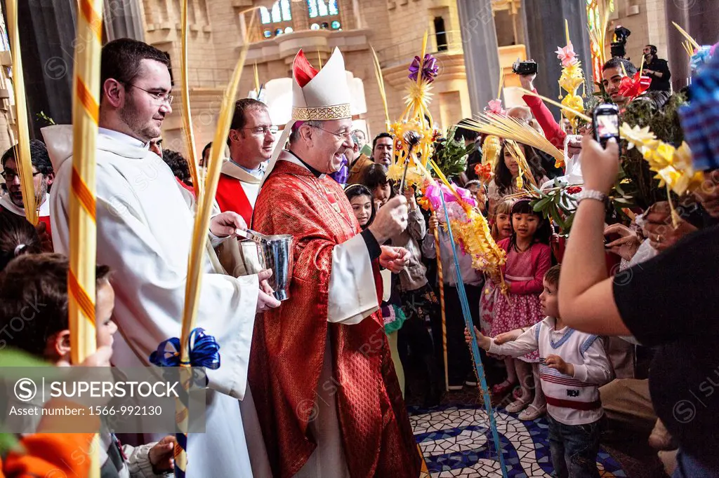 Bishop blessing the palms,mass,Palm Sunday Interior of Basilica Sagrada Familia, Barcelona, Catalonia, Spain