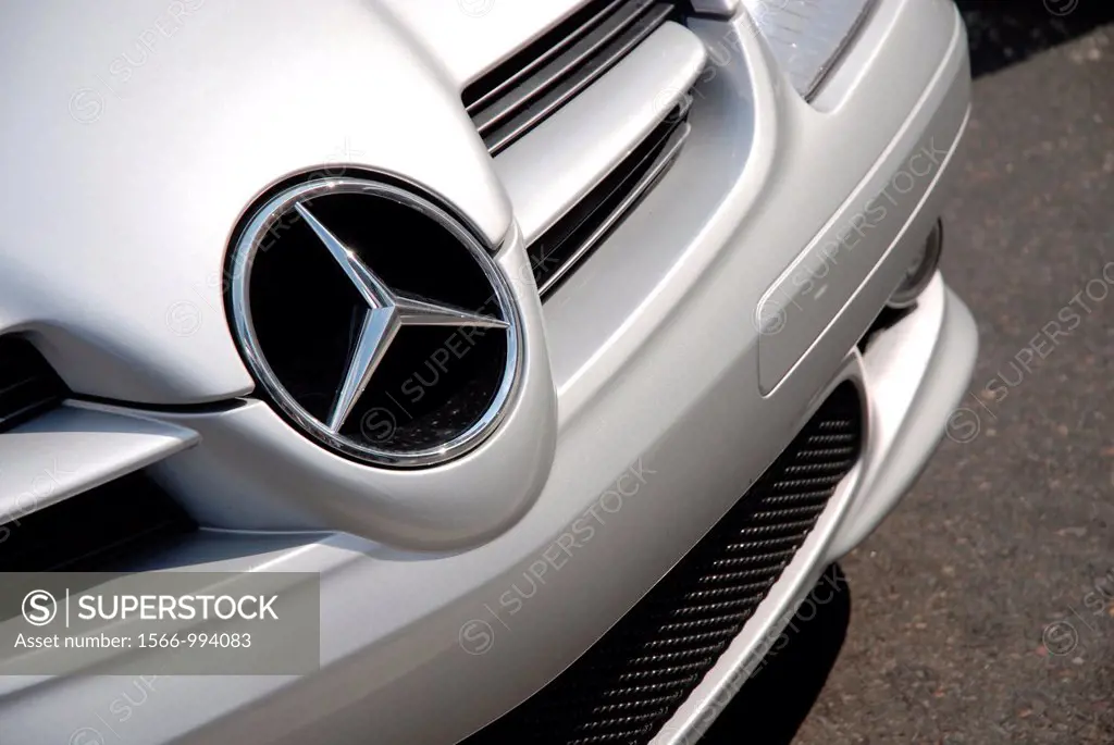 Front of a silver Mercedes SLK Mercedes star