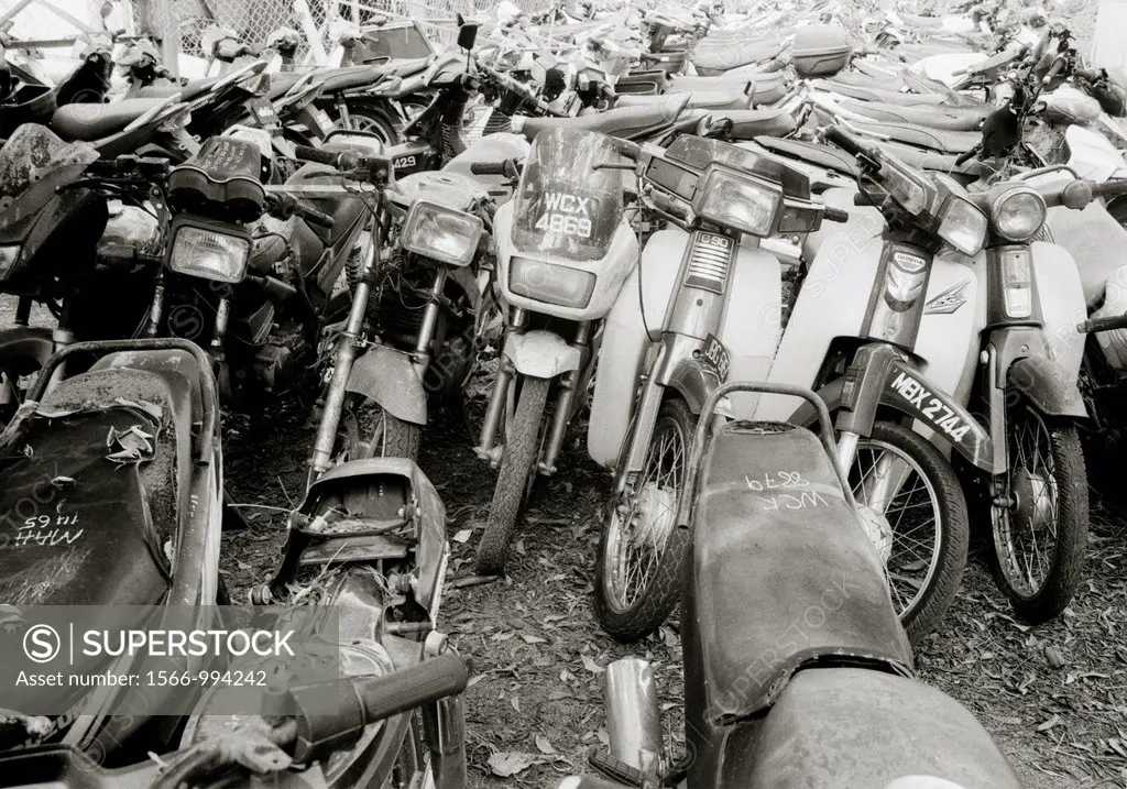 Motorbikes in Melaka Malacca in Malaysia in Southeast Asia Far East.