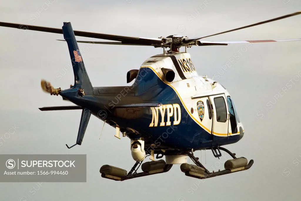 NYPD helicopter flies over the Hudson River in New York