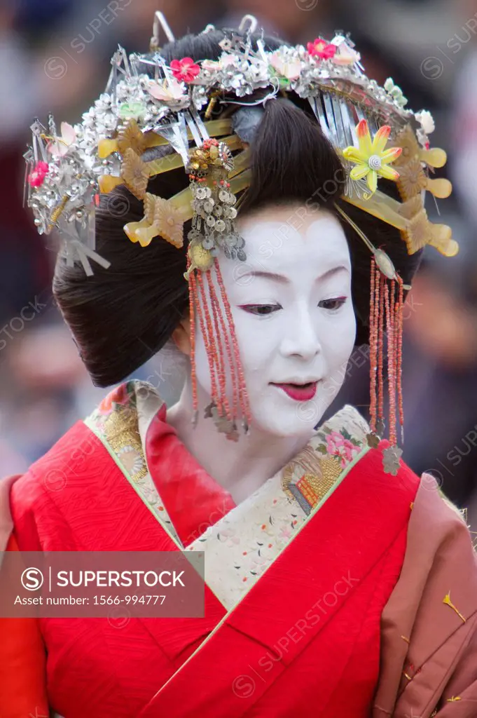 A participant in the Arashiyama Maple Leaf Festival dressed up as the ´Tayu´, the highest class prostitute in Shimabara, Kyoto