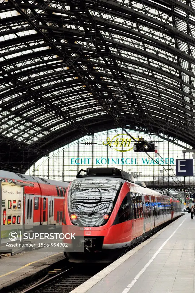 Deutsche Bahn DB high speed German intercity passenger train standing at platform in Cologne railway station, Germany