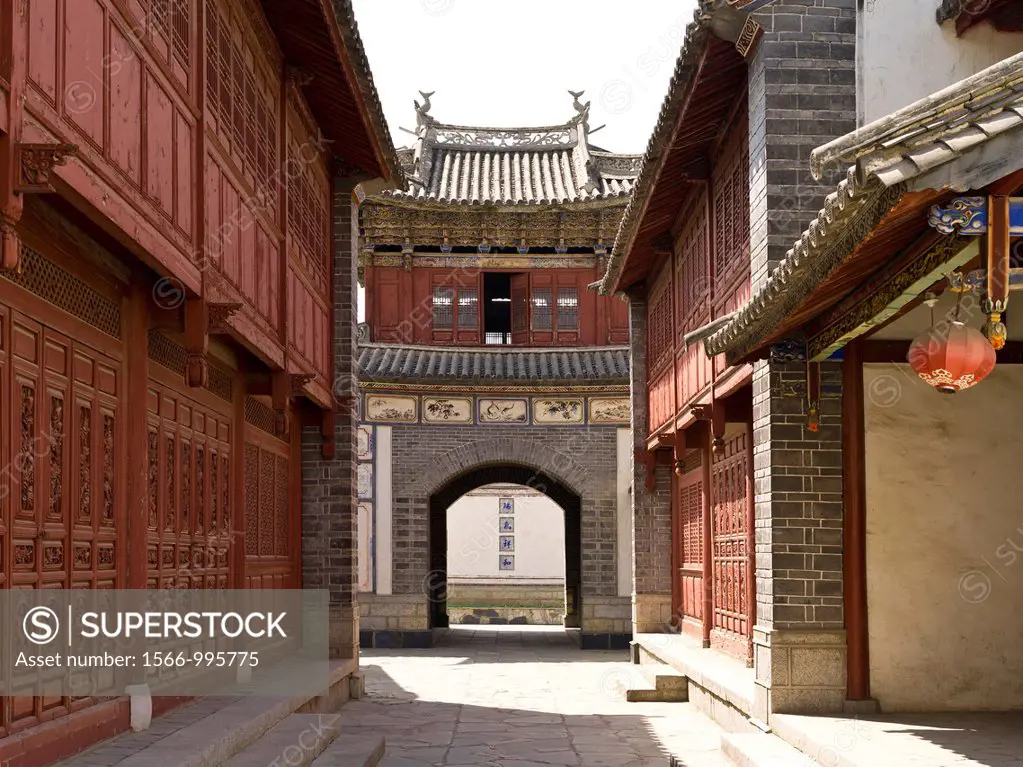 The Building Gate is delicate and profound  It has the smack of a palace or a pavilion in Central China with double eaves and raised corners  The uppe...