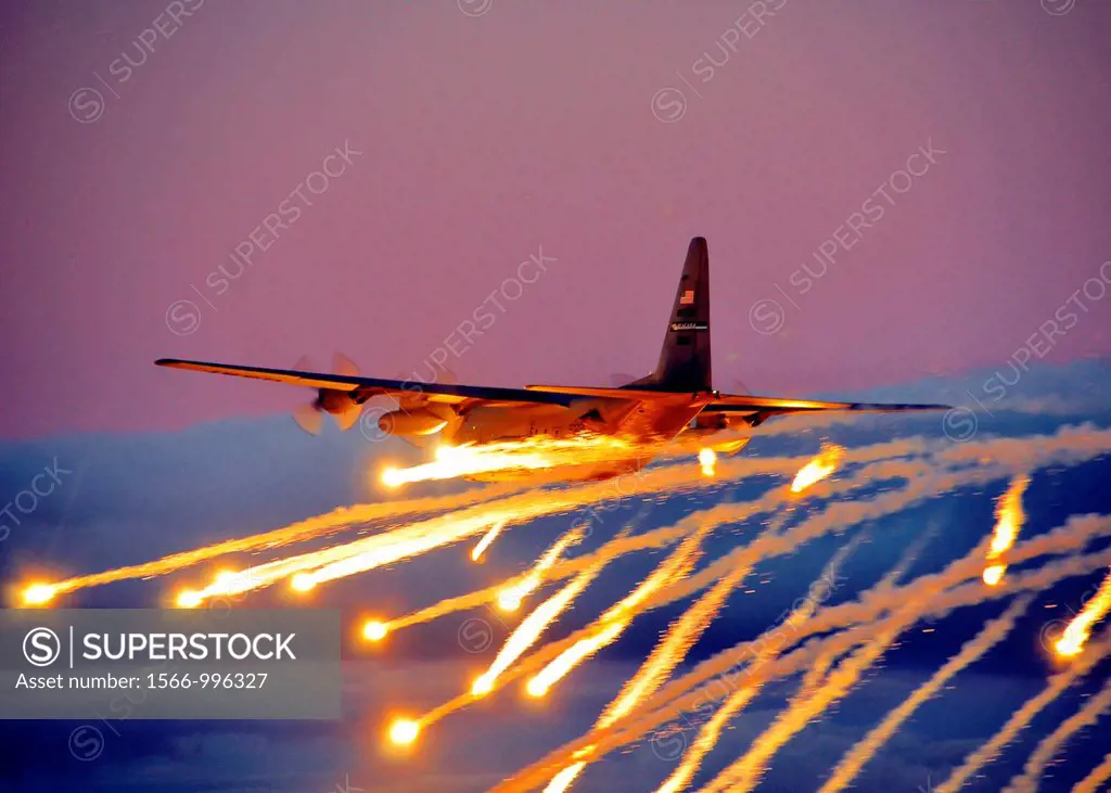 A C-130 from the Niagara Falls Air Reserve Station launches flares over Lake Ontario during a training exercise August 10, 2011, Niagara Falls, NY  Fl...