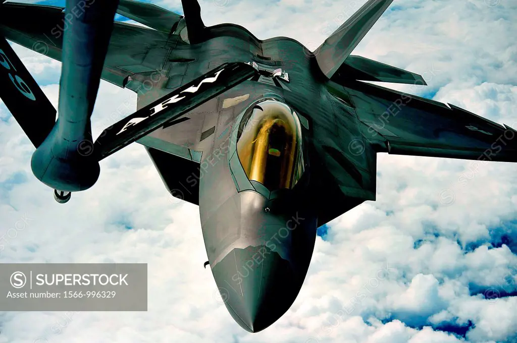 A 1st Fighter Wing´s F-22 Raptor from Joint Base Langley-Eustis, Va  pulls into position to accept fuel from a KC-135 Stratotanker with the 756th Air ...