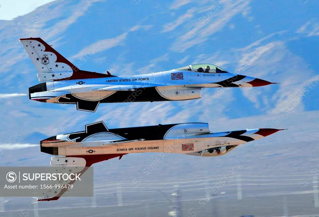 Members of the United States Air Force Air Demonstration Squadron Thunderbirds execute opposing solos while demonstrating the calypso pass Nov  12, 20...