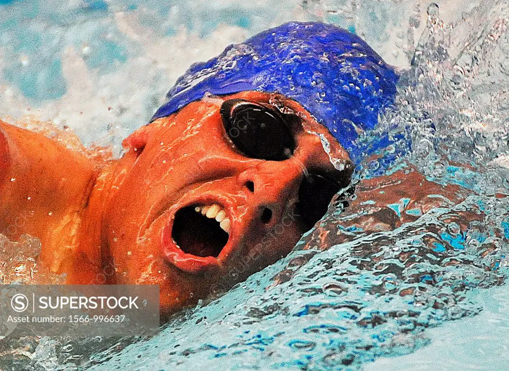 U S  Air Force 1st Lt  Ryan McGuire heads toward the finish line as he takes part in a swimming competition during Warrior Games 2012 at the U S  Air ...
