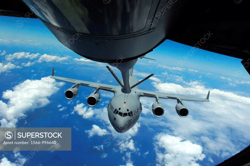 A C-17 Globemaster III prepares to connect to a KC-135 Stratotanker during an air refueling training mission over the Pacific on May 4, 2012  The miss...