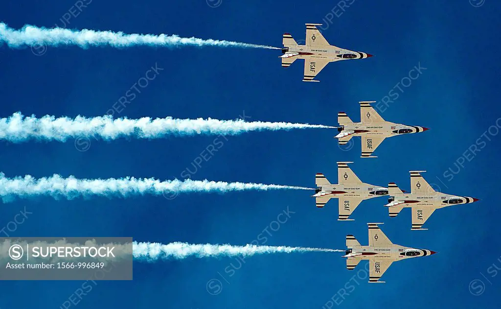 F-16 Fighting Falcon aircraft with the Thunderbirds, the U S  Air Force aerial demonstration team, perform during the 2011 Legacy of Liberty Air Show ...