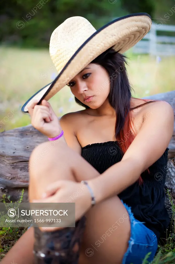 Young mexican woman with hat