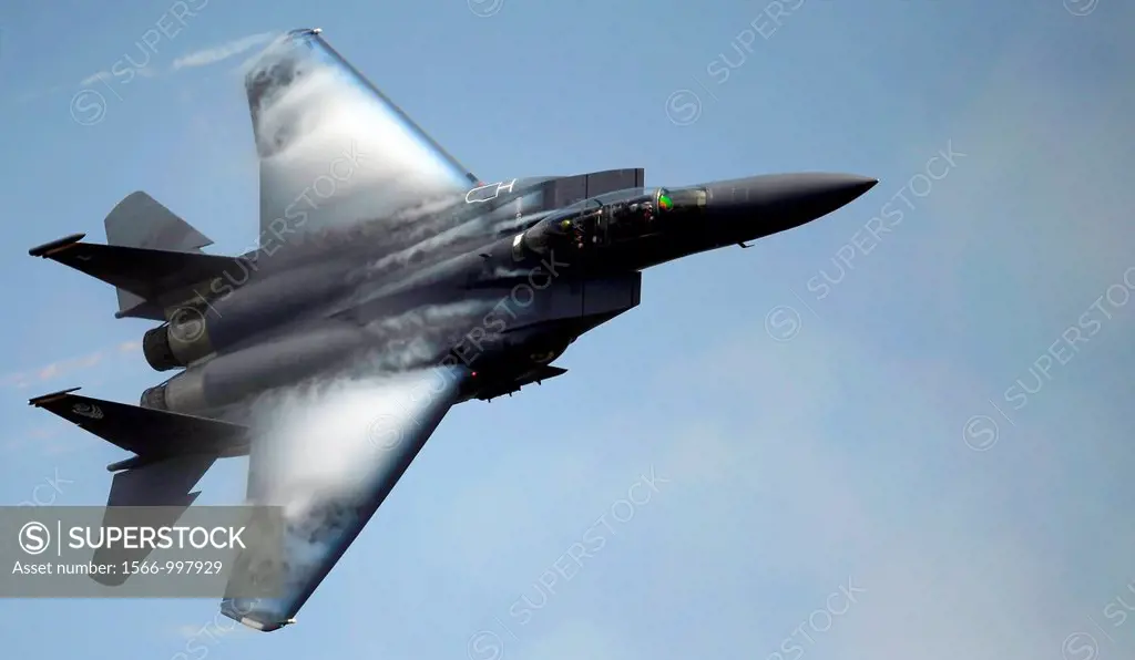 An F-15E Strike Eagle pilot demonstrates the aircrafts maneuverability April 9, 2011, during the Charleston Air Expo at Joint Base Charleston S C  Th...