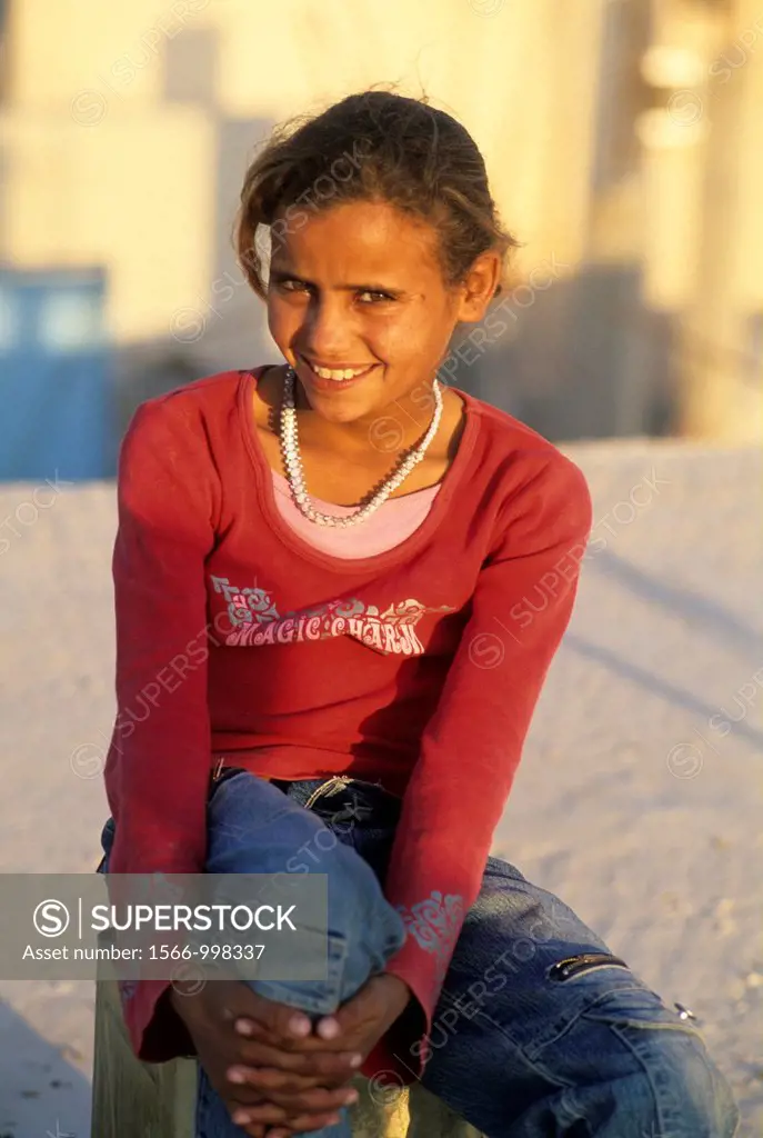 little girl from the village of Um-Sayhoun where are living the most part of Bedoins working on the Petra site, Jordan, Middle East, Asia