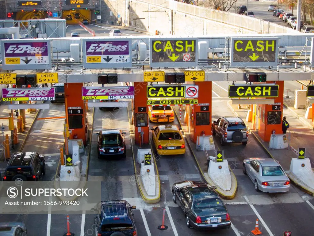 Drivers pass through the toll booths using EZ Pass at the Queens Midtown Tunnel in in New York