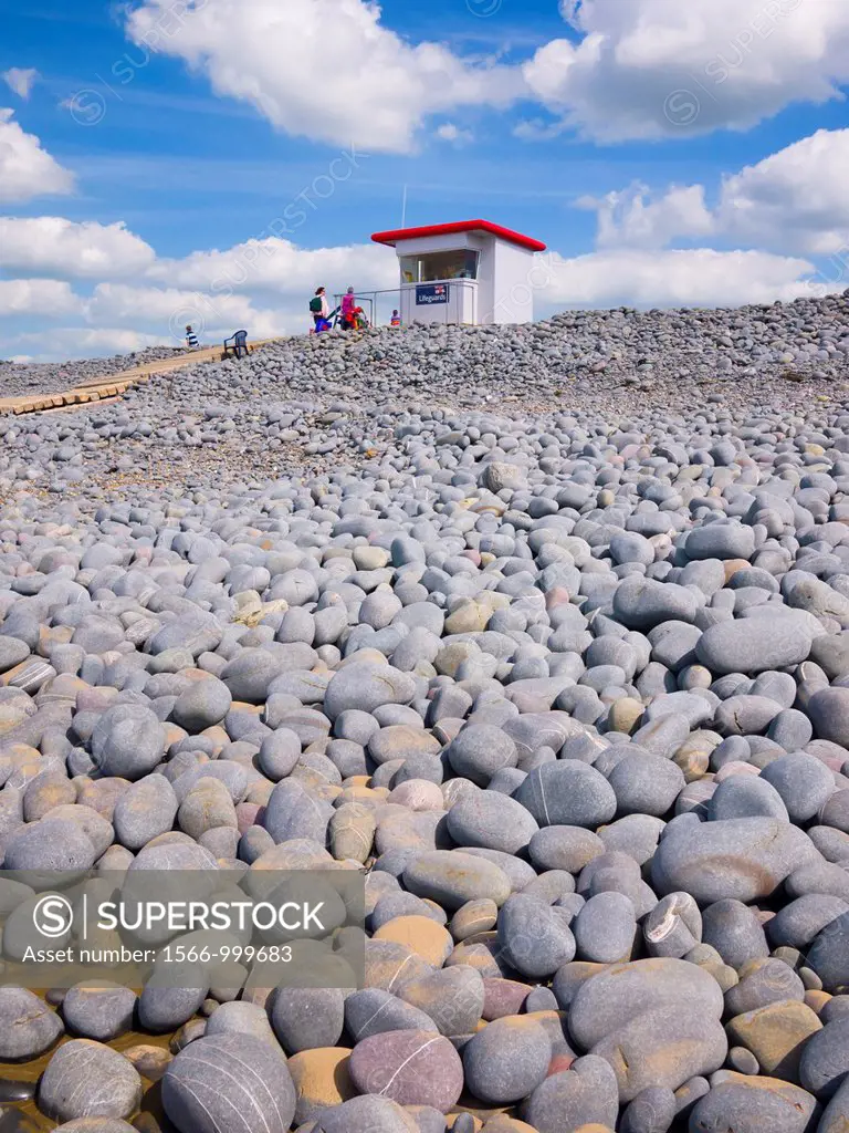 A lifeguard lookout hut on the top of the pebble ridge at Westward Ho!, Devon, England, United Kingdom