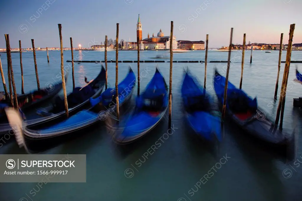 Gondolas moored in front of the Basilica of San Giorgio Maggiore, Venice, Veneto, Italy