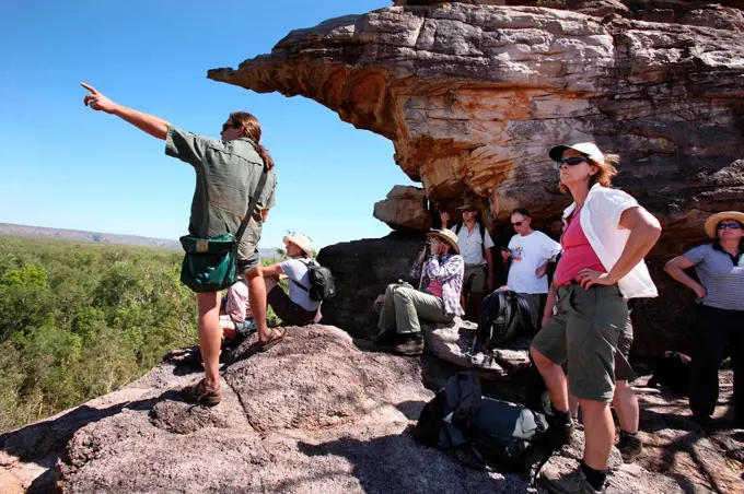 Tour guide talking to tourists in Kakadu National Park  Northern Territory, Australia