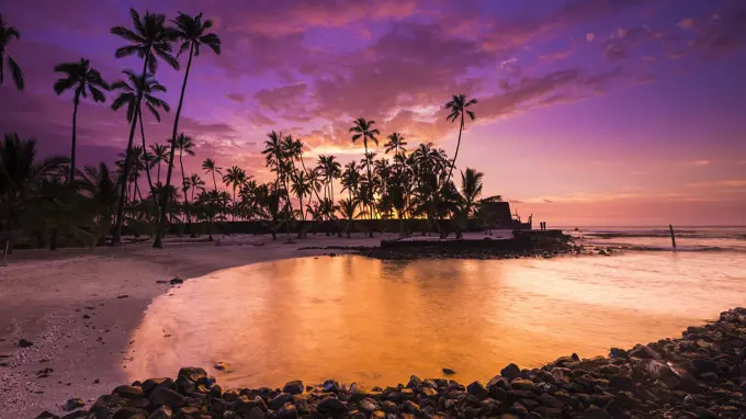 Sunset over Pu'uhonua O Honaunau National Historic Park (City of Refuge), Kona Coast, Hawaii USA.