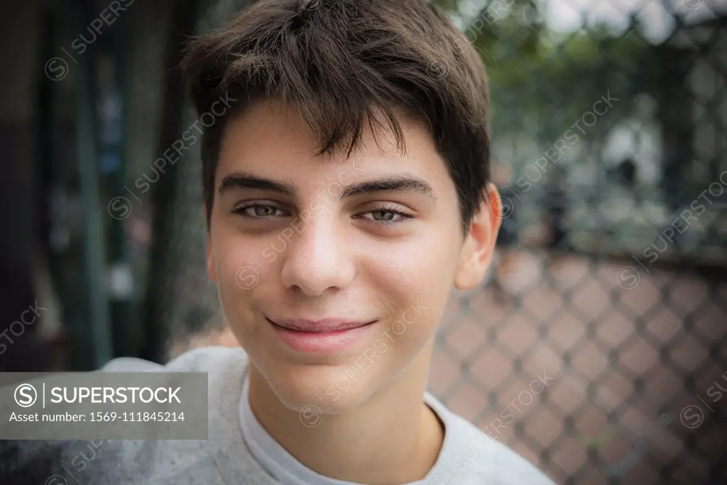 Close-up of smiling teenage boy