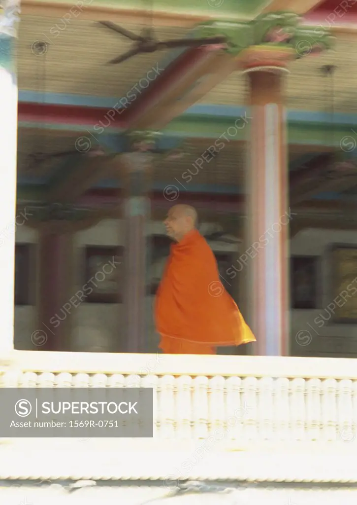 India, Ahmedabad, monk in buddhist temple