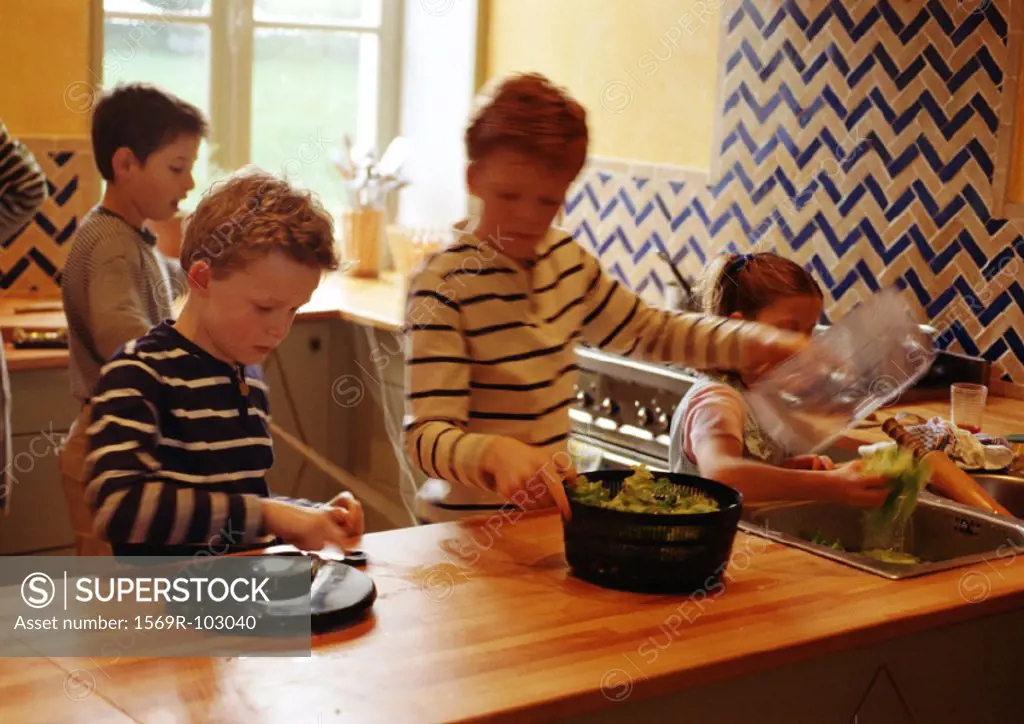 Children in kitchen, blurred