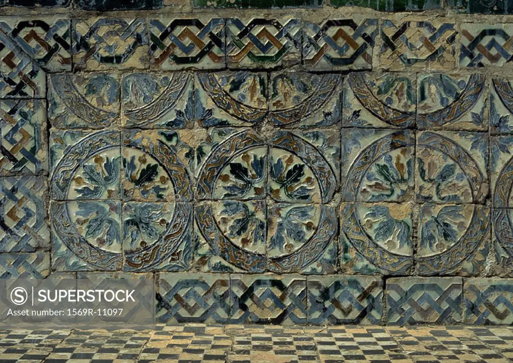 Tile mosaic with floral motif, close-up