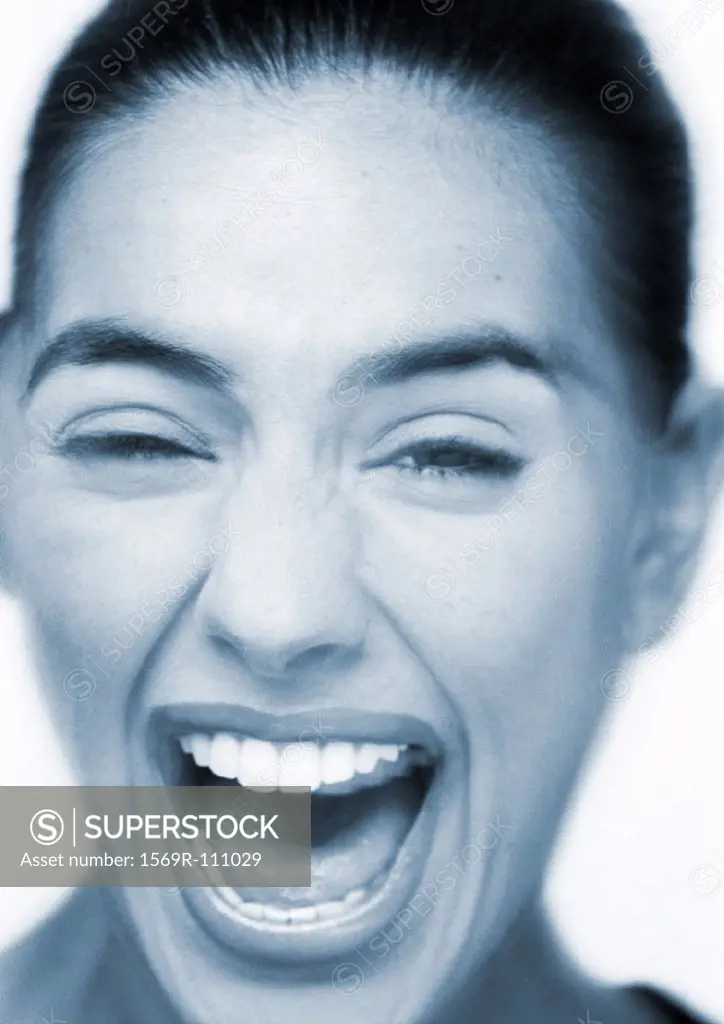 Woman laughing, close-up, portrait