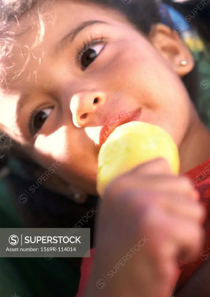 Girl eating ice cream, close-up