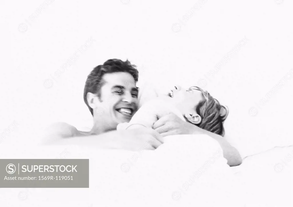 Couple laughing, b&w
