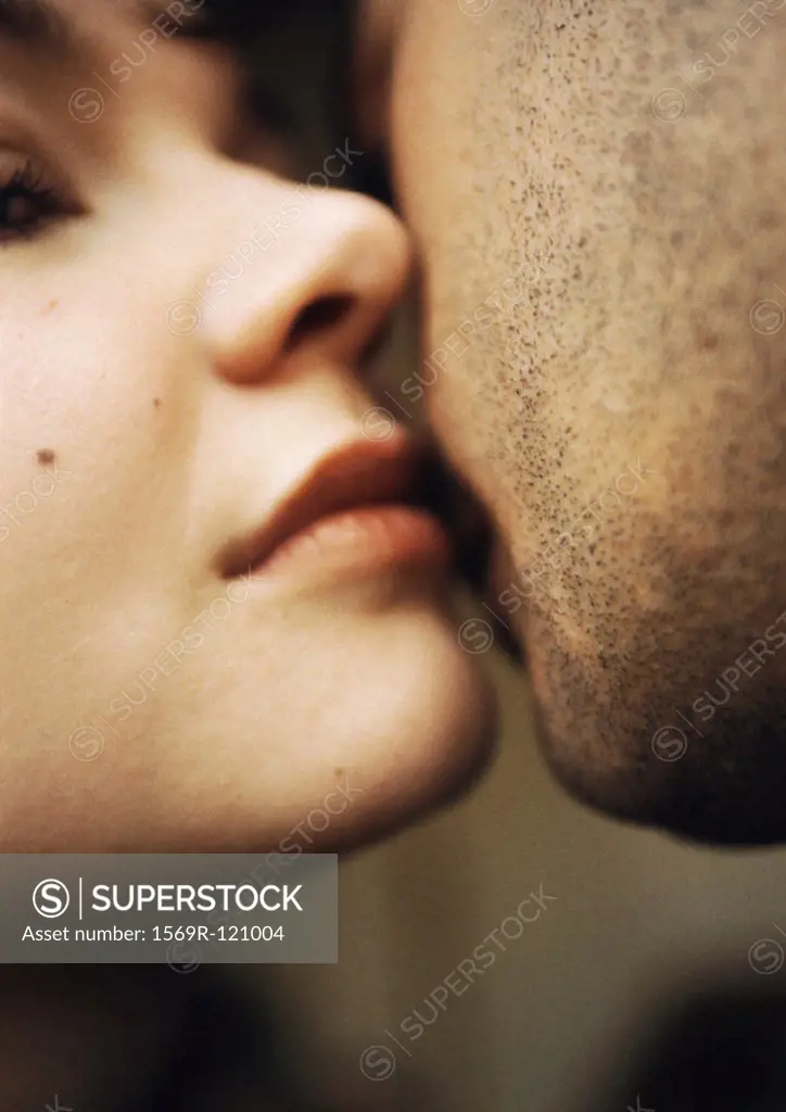 Couple kissing, close-up