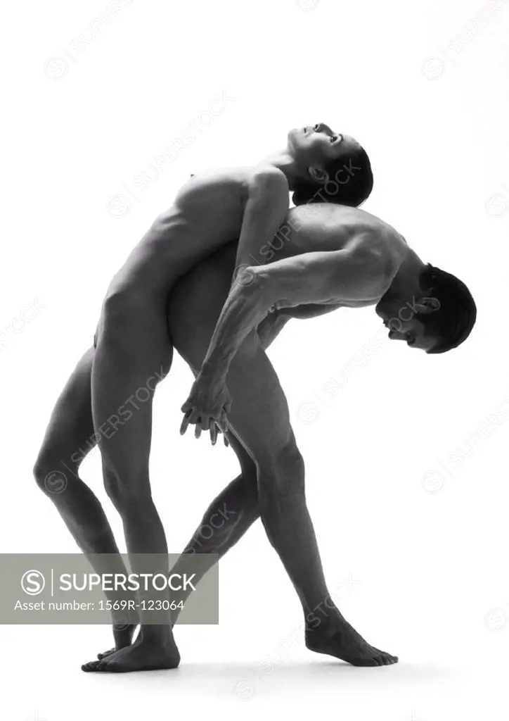 Nude man and woman back to back, man bending forward, woman bending backwards, b&w