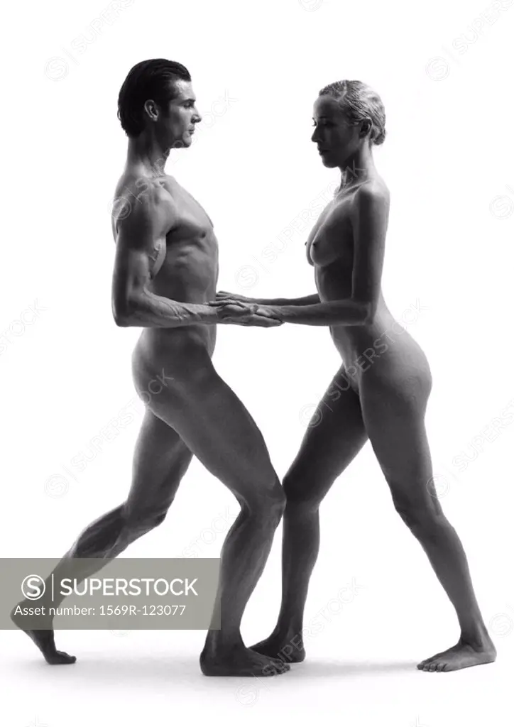 Nude man and woman dancing, b&w