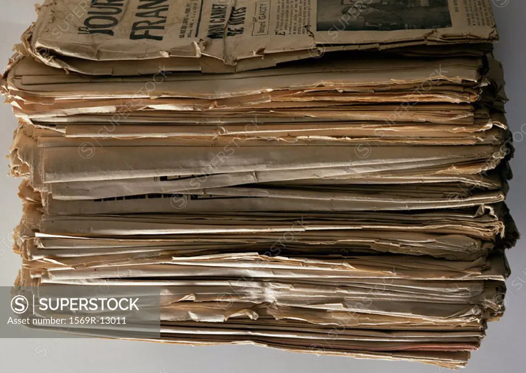 Pile of old newspaper, close-up