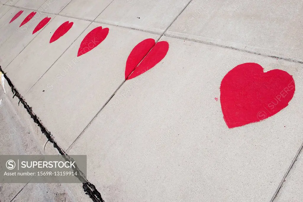 Hearts stenciled on sidewalk